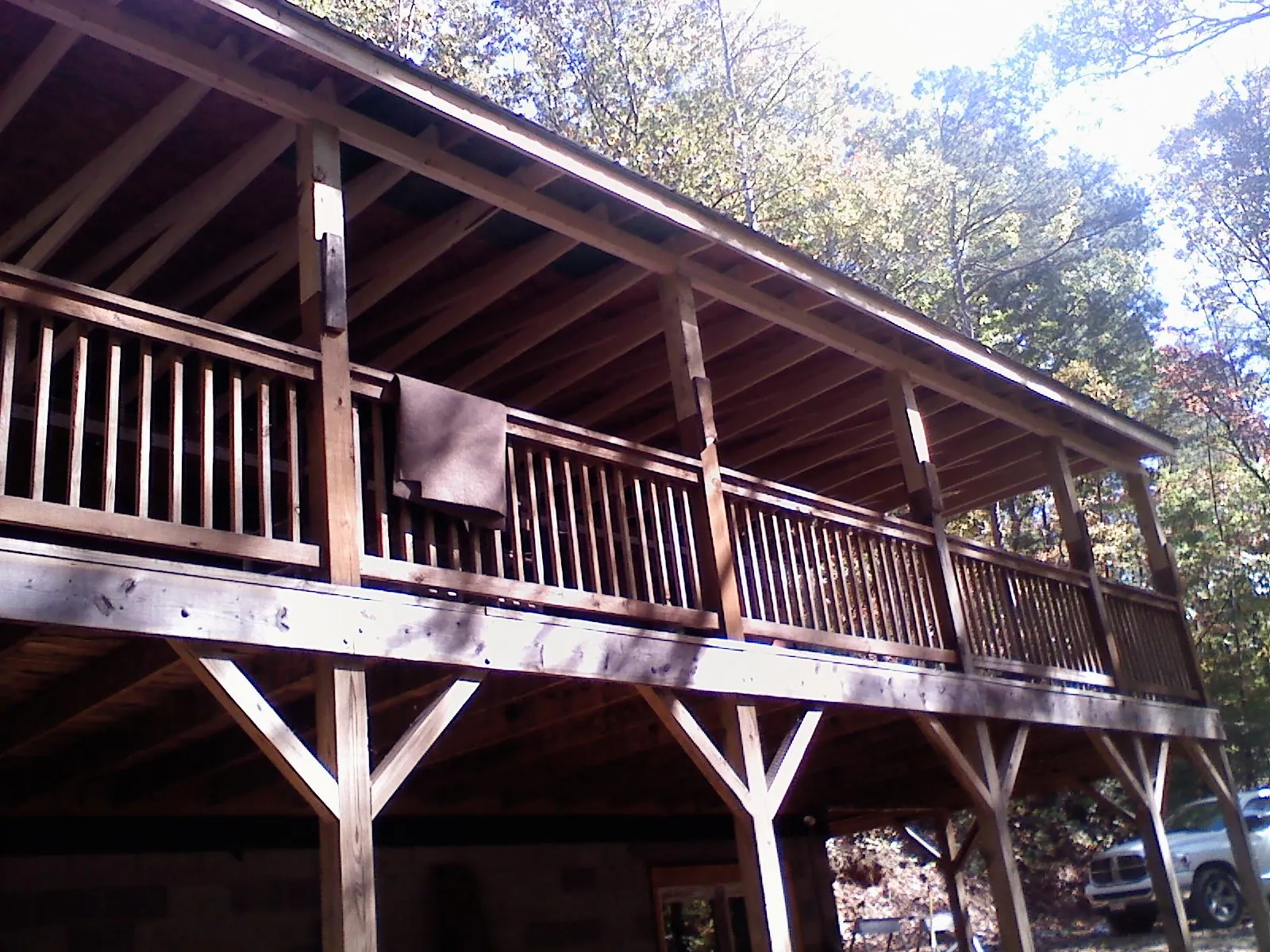 Timber framing under a new elevated porch and deck — Roof Leak Repair in Richland by Roofing Brothers